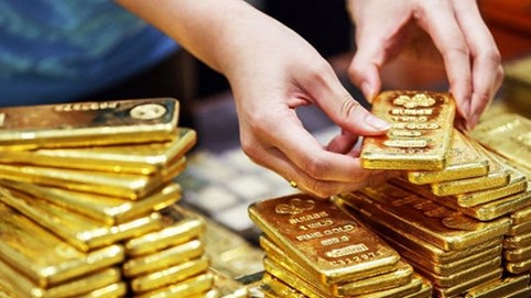 Giá vàng giảm mạnh, mất mốc 1.400 USD/ounce