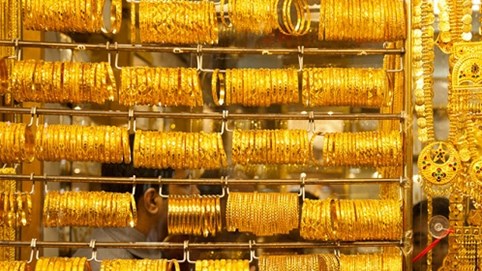 Giá vàng hôm nay 25/11: Vàng giữ giá, USD bớt nóng