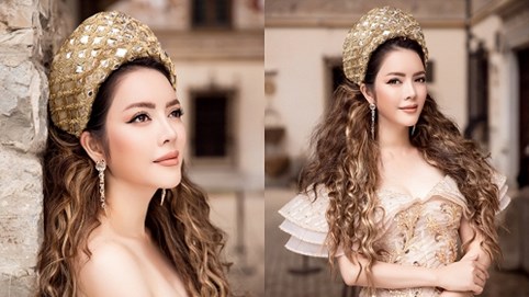 Lý Nhã Kỳ mặc váy công chúa tạo dáng trong lâu đài cổ