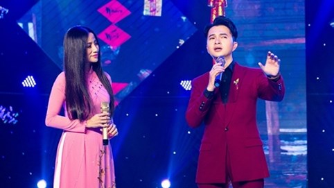 Trang Thảo tái xuất sau 3 năm, diện áo dài hát nhạc xuân cùng Nam Cường