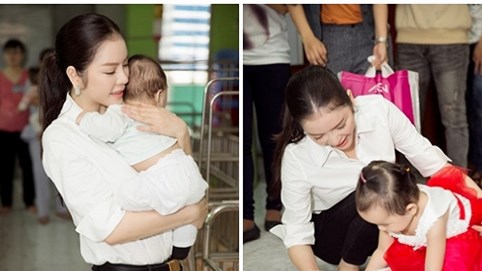 Lý Nhã Kỳ xúc động khi thăm trẻ em khuyết tật
