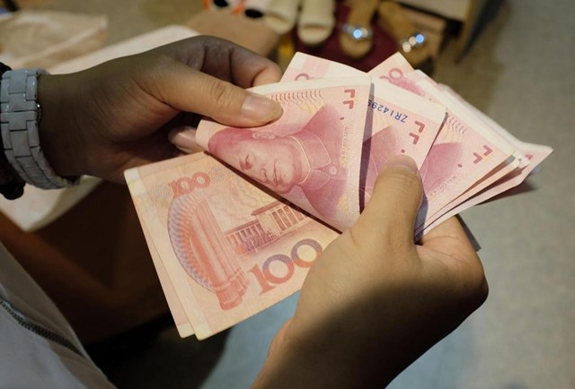 Ch&iacute;nh quyền Trung Quốc đặt kỳ vọng v&agrave;o đồng nh&acirc;n d&acirc;n tệ kỹ thuật số để x&oacute;a bỏ thế độc quyền của c&aacute;c đại gia c&ocirc;ng nghệ. Ảnh:&nbsp;Reuters.