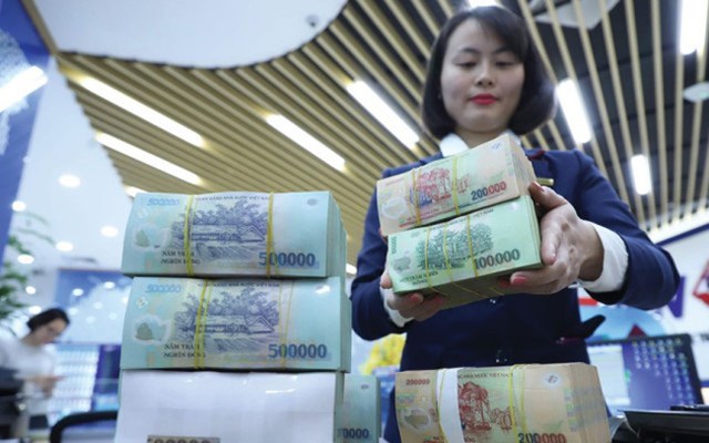Bất chấp Covid-19, c&#225;c ng&#226;n h&#224;ng vẫn đua b&#225;o l&#227;i đậm trong năm 2020 - Ảnh 1