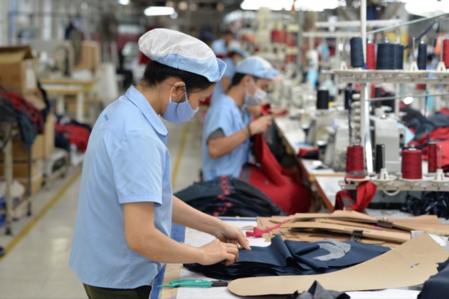 Thị trường dệt may gặp kh&#243;, Vinatex (VGT) b&#225;o lỗ qu&#253; đầu ti&#234;n - Ảnh 1