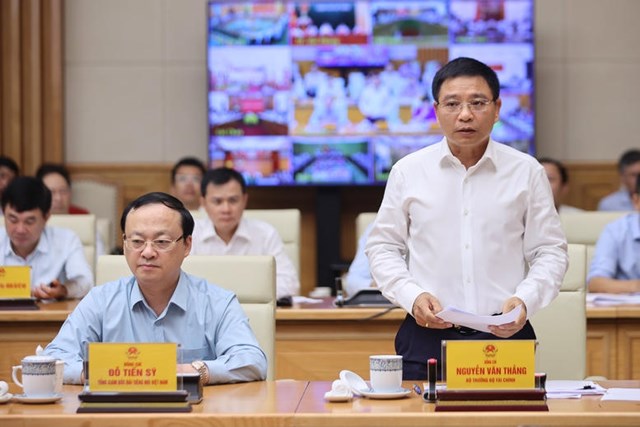 Bộ trưởng Bộ Tài chính Nguyễn Văn Thắng phát biểu tại hội nghị. (Ảnh: VGP).