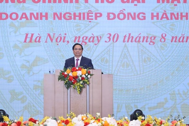Thủ tướng Phạm Minh Ch&iacute;nh gửi tới cộng đồng doanh nghiệp, doanh nh&acirc;n Việt Nam lời ch&agrave;o tr&acirc;n trọng, lời thăm hỏi &acirc;n t&igrave;nh v&agrave; lời ch&uacute;c mừng tốt đẹp nhất - Ảnh: VGP/Nhật Bắc