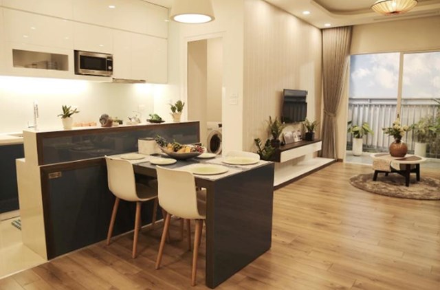 Một phần kh&ocirc;ng gian ph&ograve;ng kh&aacute;ch v&agrave; ph&ograve;ng bếp tại Anland Premium&nbsp;