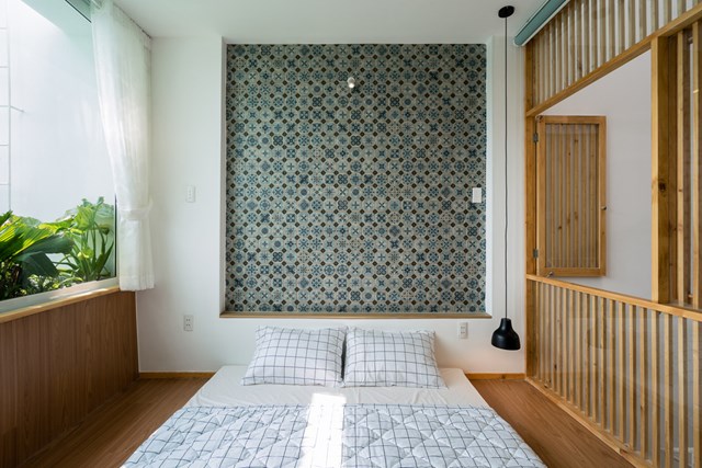 Căn nh&#224; 72 m2 tạo cảm gi&#225;c cứ &#39;tan ra, rộng r&#227;i, xuy&#234;n suốt&#39; - Ảnh 7