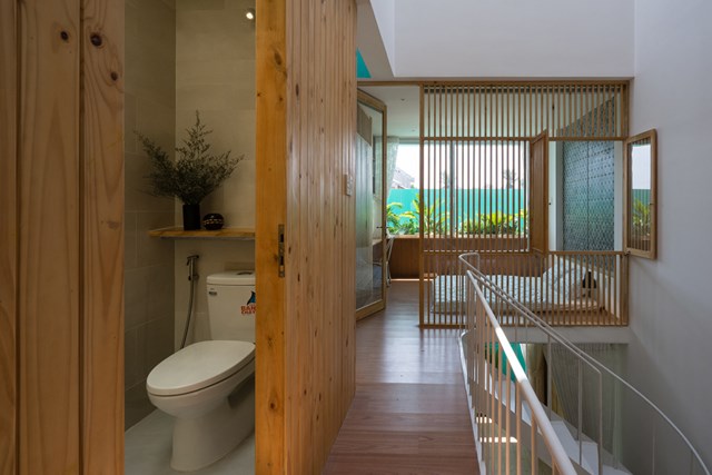 Căn nh&#224; 72 m2 tạo cảm gi&#225;c cứ &#39;tan ra, rộng r&#227;i, xuy&#234;n suốt&#39; - Ảnh 8