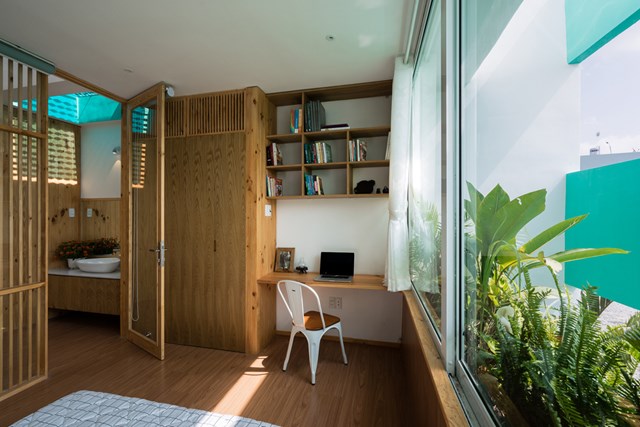 Căn nh&#224; 72 m2 tạo cảm gi&#225;c cứ &#39;tan ra, rộng r&#227;i, xuy&#234;n suốt&#39; - Ảnh 5