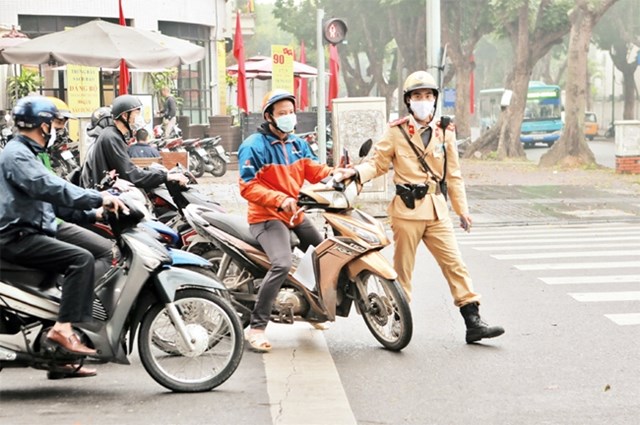 Xả nhiều r&#225;c phải trả nhiều tiền; vi phạm giao th&#244;ng bị phạt tối đa 75 triệu... l&#224; những ch&#237;nh s&#225;ch c&#243; hiệu lực trong th&#225;ng 1/2022 - Ảnh 1