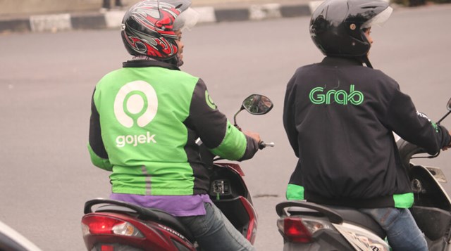 Grab v&#224; c&#244;ng ty mẹ của Gojek khởi động lại đ&#224;m ph&#225;n s&#225;p nhập - Ảnh 1
