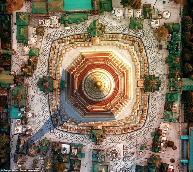 Nh&igrave;n từ tr&ecirc;n cao, c&aacute;c gian h&agrave;ng, điện thờ v&agrave; chu&ocirc;ng ch&ugrave;a Shwedagon 2.600 năm tuổi ở Myanmar tạo th&agrave;nh một "ch&ograve;m sao" theo vũ trụ học của người Hindu.