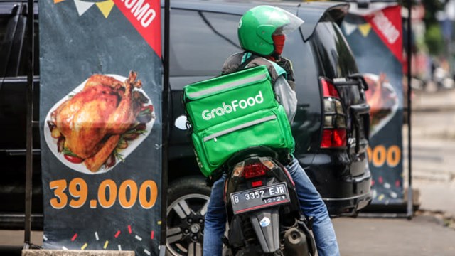 Grab hiện c&oacute; khoảng 5 triệu "t&agrave;i xế đối t&aacute;c". Ảnh: EPA.